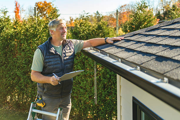 Professional Roofing technician working in Weldon, IA